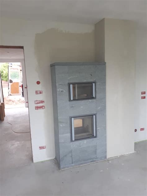 Notranjost sobe v Guesthouse Lučić z detajli kamnitega kamina