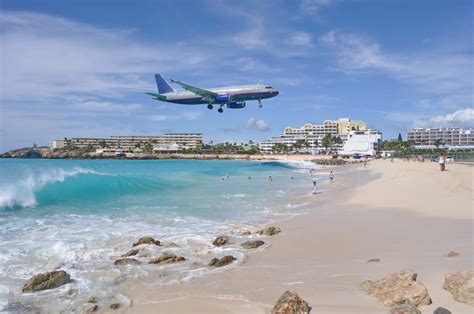 Letalo, ki pristaja nad Maho Beach