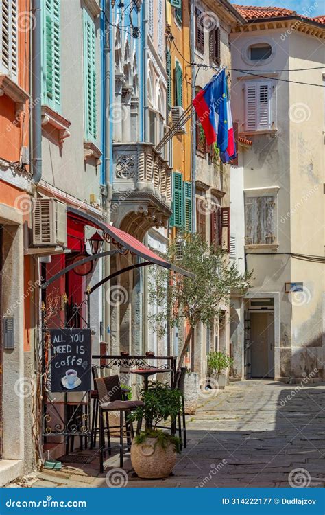 Street sign in Piran showing street name in Slovene and Italian