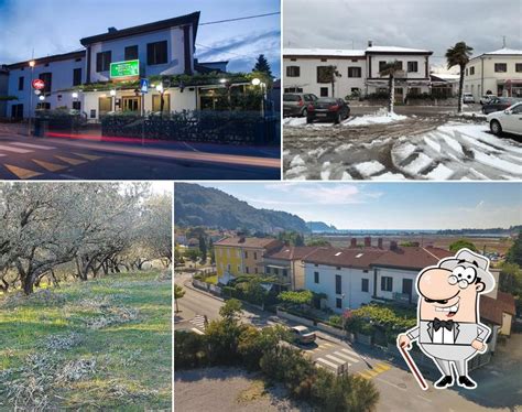 Zunanji pogled na gostilno Pod Trto s teraso pod trto